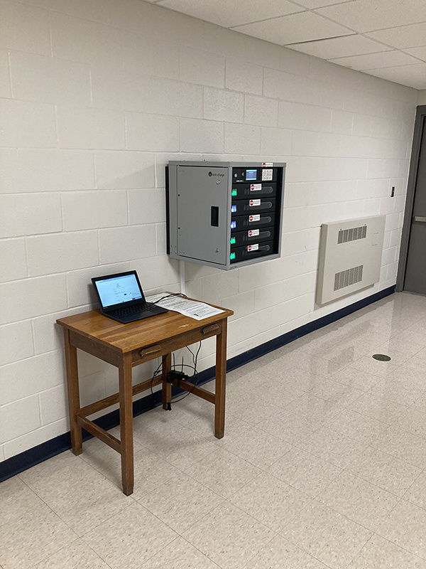 LocknCharge FUYL Tower 5 Smart Charging Locker wall mounted in a hallway at Mondovi Schools
