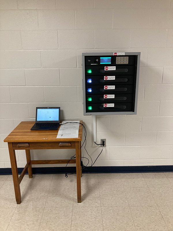 LocknCharge FUYL Tower 5 Smart Charging Locker wall mounted in a hallway at Mondovi Schools